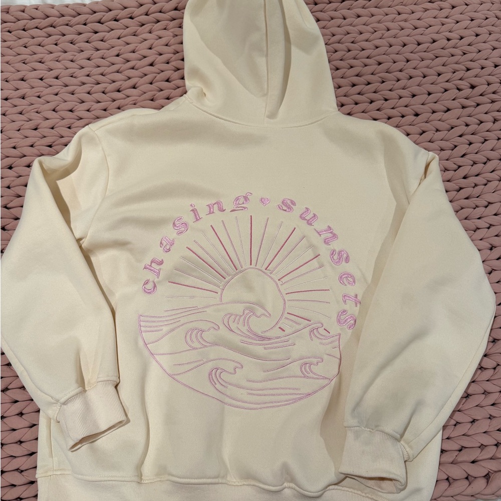 Cream Hoodie with Pink Graphic